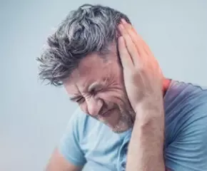 Osoba sa zujanjem u ušima